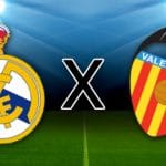 Real Madrid e Valencia se enfrentam neste sábado, às 11h15 (horário de Brasília), no Santiago Bernabéu, pela 30ª rodada da LaLiga. Transmissão exclusiva no Disney+. O Real Madrid busca o título, enquanto o Valencia luta contra o rebaixamento. Escalações confirmadas com destaque para Mbappé e Hugo Duro.
